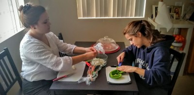 Cutting peppers and onions